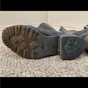 Some slight cracking on top of foot. Well loved. Vintage. Made in England.